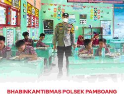 Bhabinkamtibmas Polsek Pamboang Dampingi Distribusi Makanan Bergizi Gratis di SDN 18 Bababulo